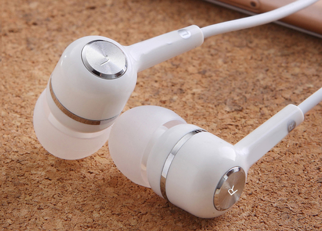 Why don’t mobile phone manufacturers come with headphones as standard?